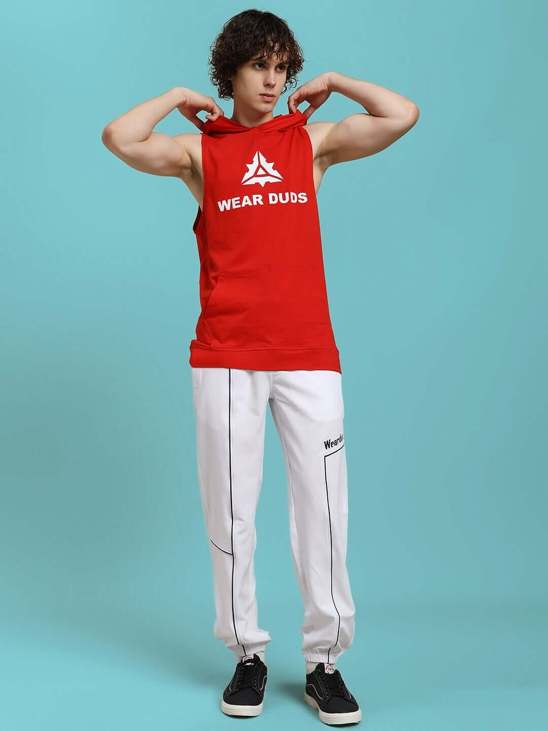 Model wearing CYBRAN GYM HOODED T-SHIRT - RED showcasing athletic fit and bold style.