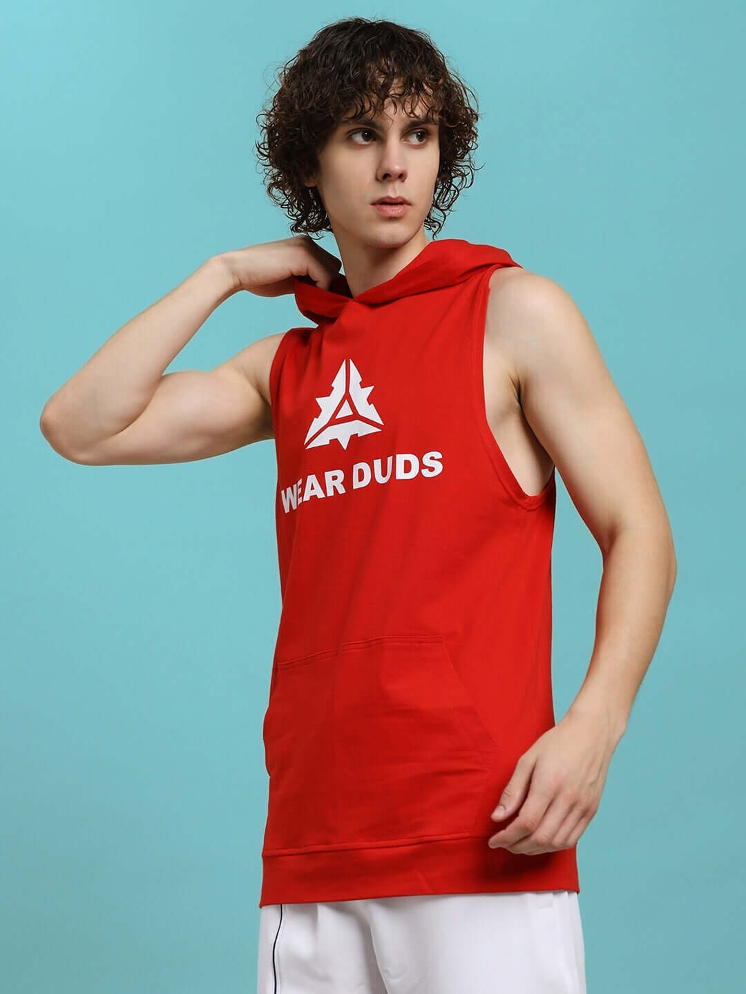 Model wearing red CYBRAN GYM hooded T-shirt by DUDS, showcasing sleeveless design ideal for custom fit and active wear.