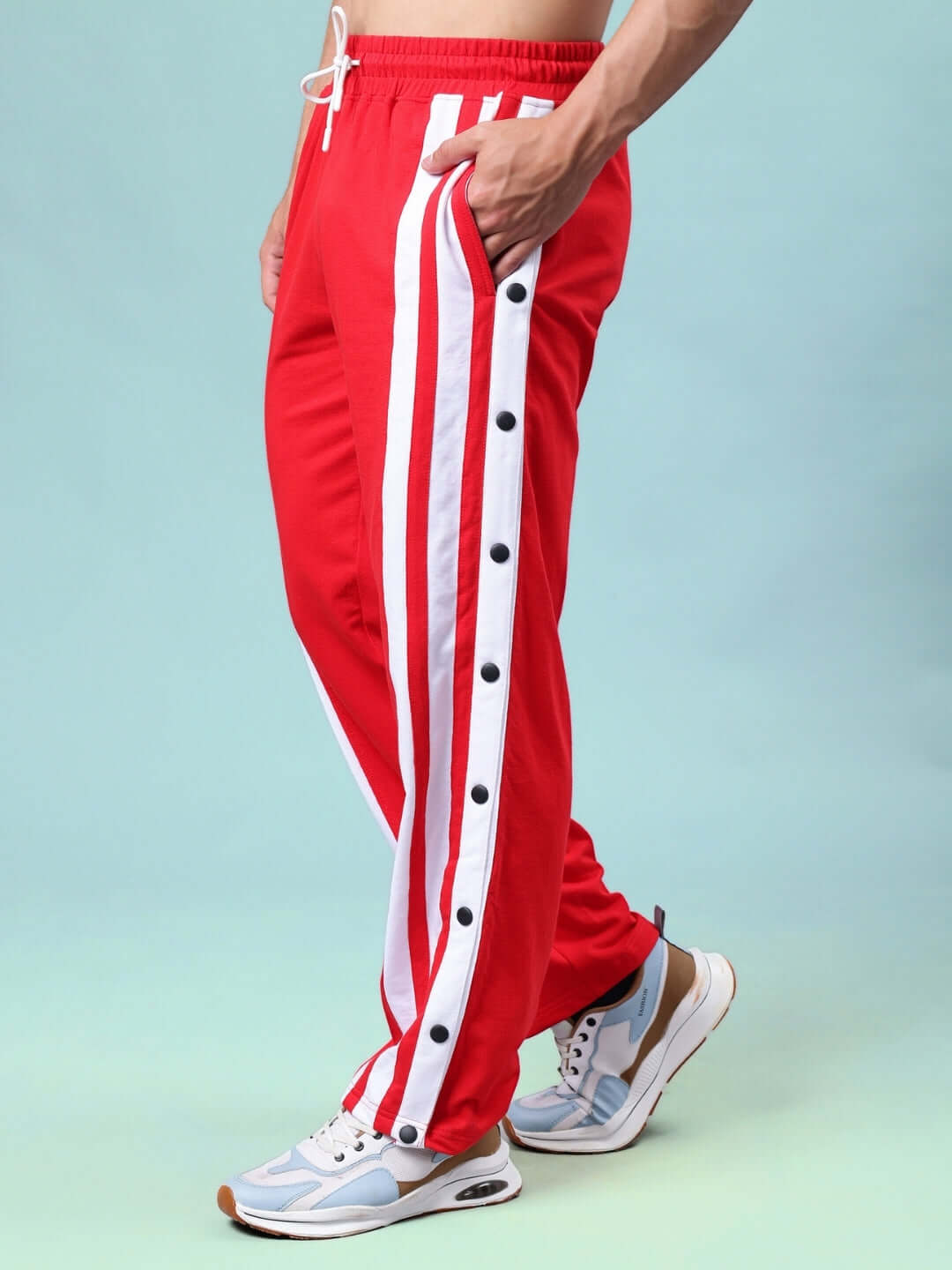 Red and white dancer joggers with side button detail, made-to-order by DUDS Tailors. Custom fit available for prepaid orders.