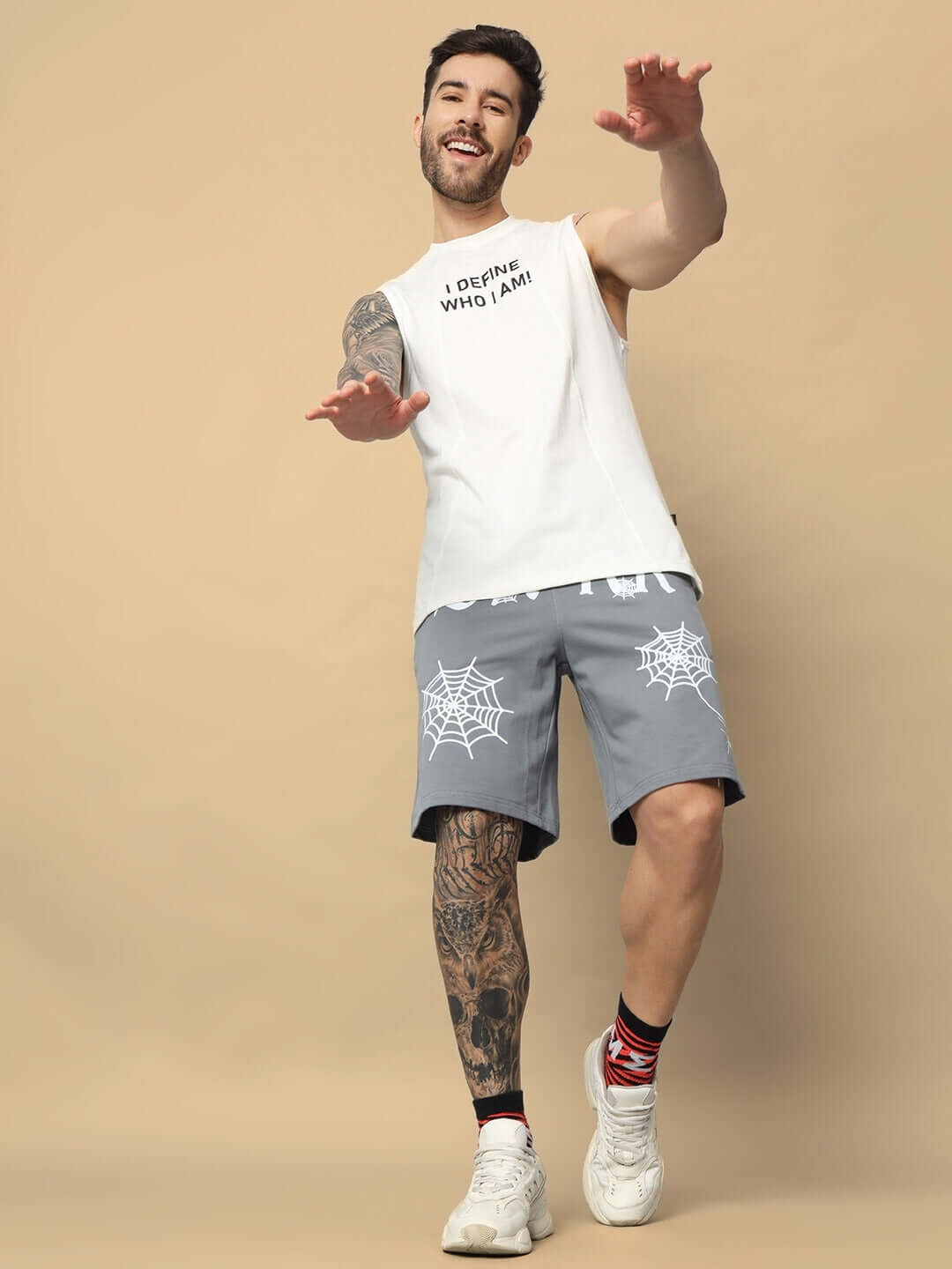Model wearing Dark Web Regular Fit Grey Shorts, showcasing unique web design, perfect for casual style. Custom fit available.