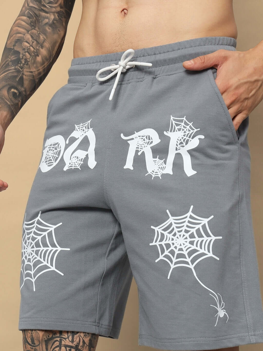 DARK WEB grey shorts featuring spider-web design, adjustable drawstring, and regular fit for custom sizing options.