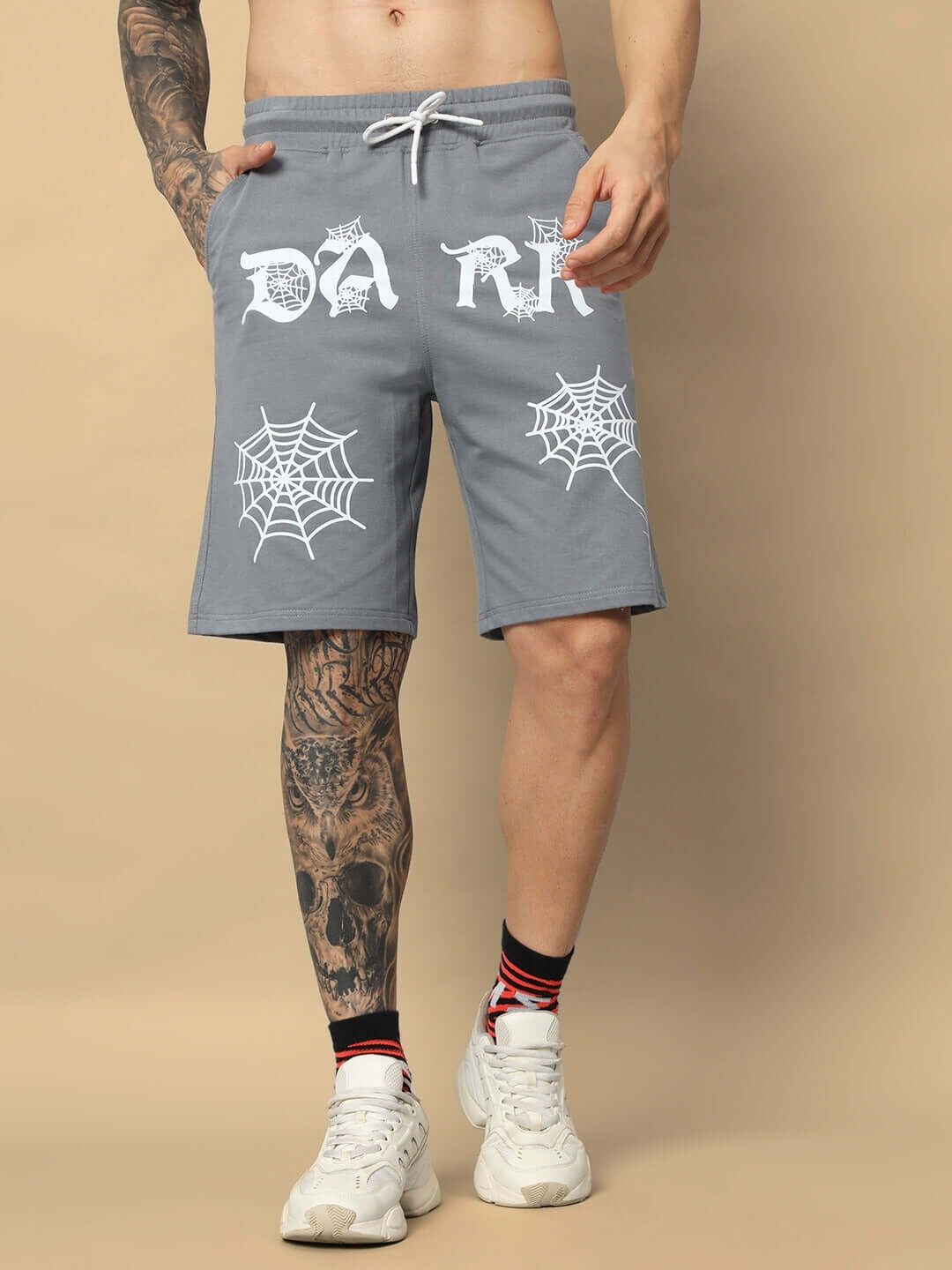 Grey Dark Web Regular Fit Shorts with spider web design, showcasing casual style on model. Custom fit option available for tailored comfort.