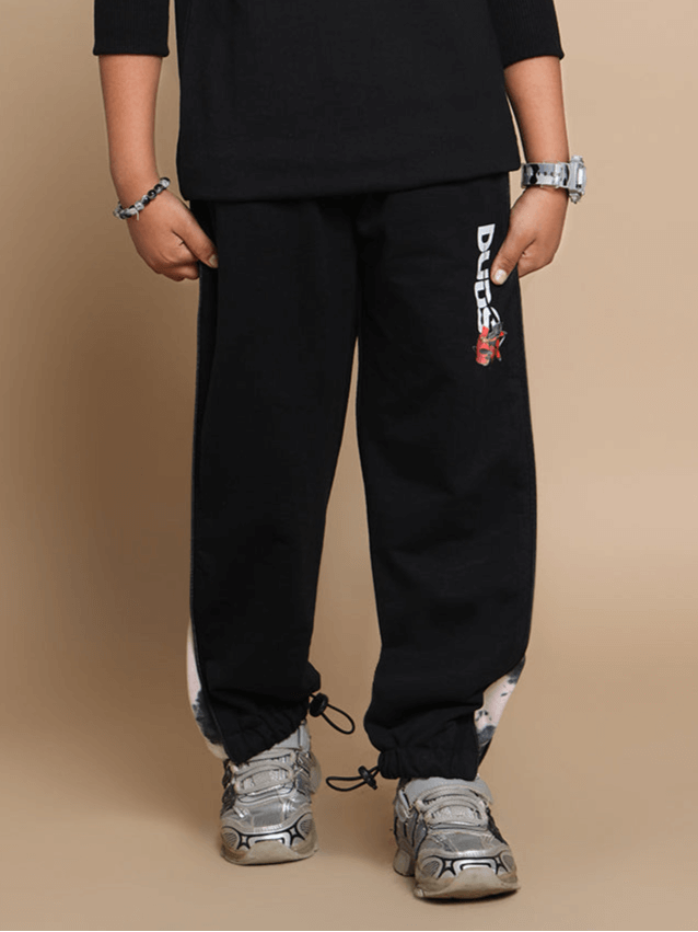 Black Deadpool jogger pants for boys and girls by DUDS, showcasing logo detail; comfortable and customizable fit.