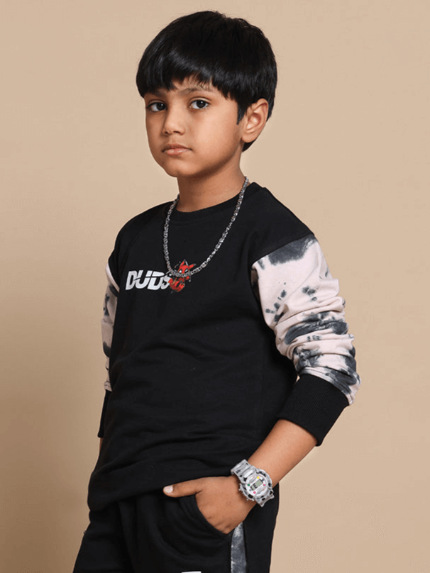 Young boy wearing a black Deadpool oversized sweatshirt by DUDS with customized fit options.