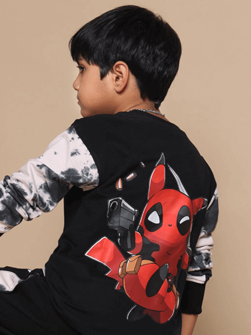 Child wearing Deadpool-themed black and beige co-ord, featuring a cartoon character print on the back. Perfect for boys and girls.