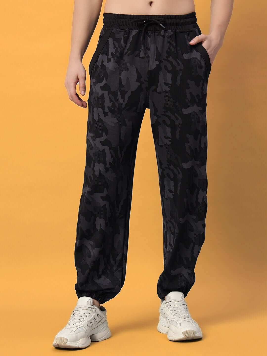 Model wearing Navy Camo Defence Relaxed Pant Jogger, showcasing comfortable fit and stylish design by DUDS.