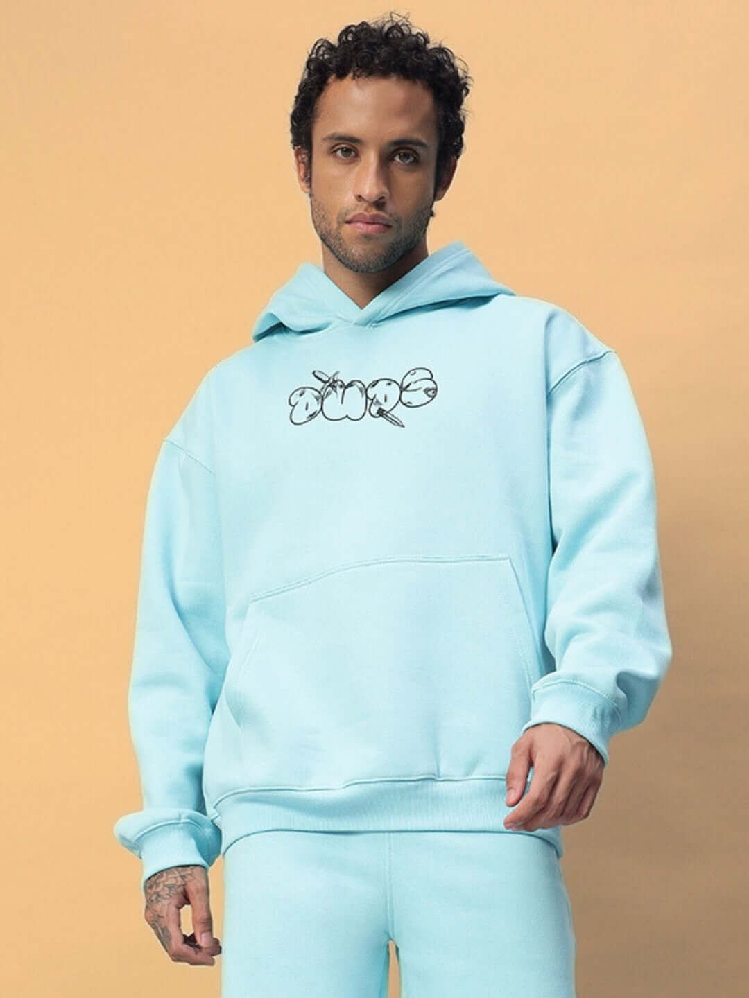 Model wearing WEARDUDS DEMON FLEECE HOODIE SKY BLUE, front view showcasing style and color.
