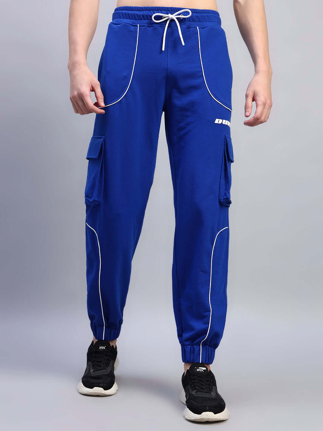 DEVENO blue relaxed-fit joggers with cargo pockets, displaying tailored design and customizable fit options for optimal comfort.