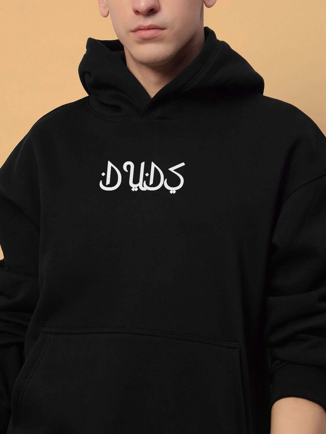 Teen in black DIMENSION COTTON FLEECE CO-ORD hoodie, showcasing unisex style and street-ready look for kids.