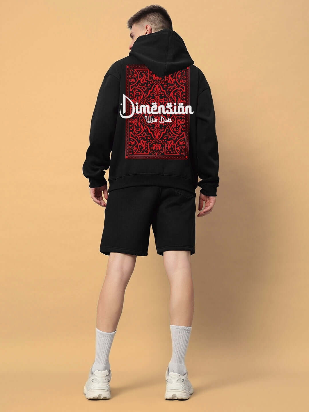 DIMENSION COTTON FLEECE CO-ORD BLACK hoodie and shorts on model, showcasing unisex streetwear style and comfort.