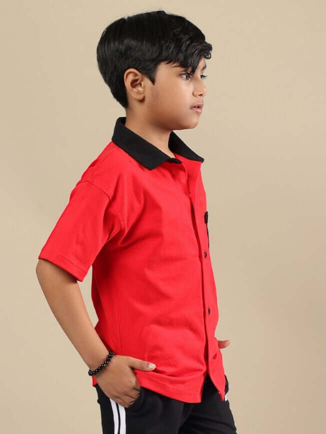 Child wearing DORIC SHIRT FOR BOYS & GIRLS RED BLACK, showcasing vibrant color and casual style, made from premium cotton.
