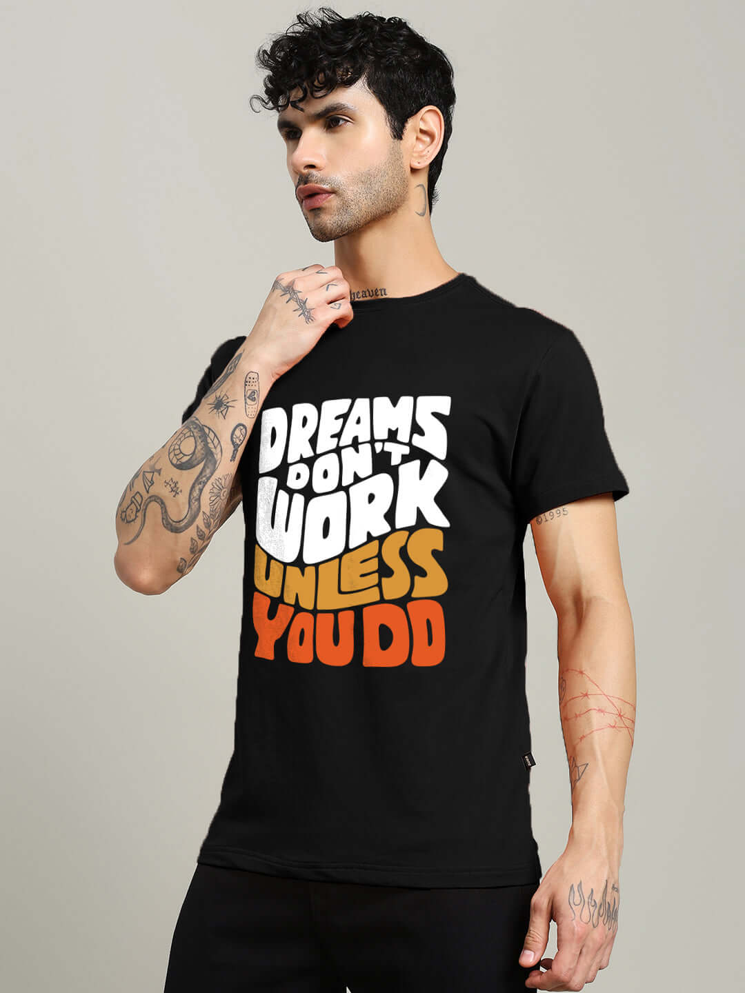 Man wearing DREAMS regular fit black T-shirt with motivational quote, 100% cotton, bio-washed, comfortable fit