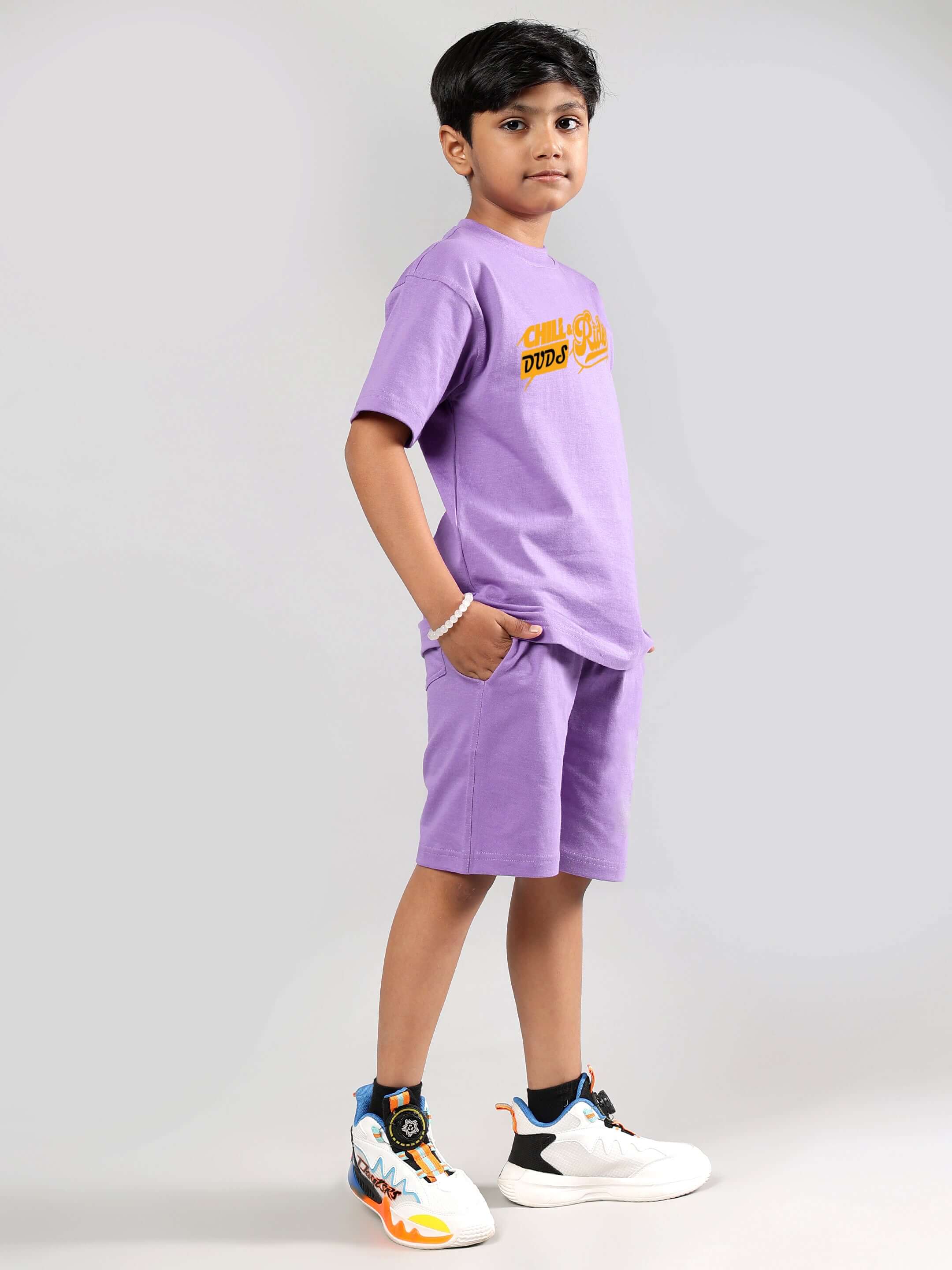 Child wearing DUDS CHILL RIDE CO-ORD FOR BOYS GIRLS LAVENDER, a comfy cotton-blend outfit for all-day comfort and style.