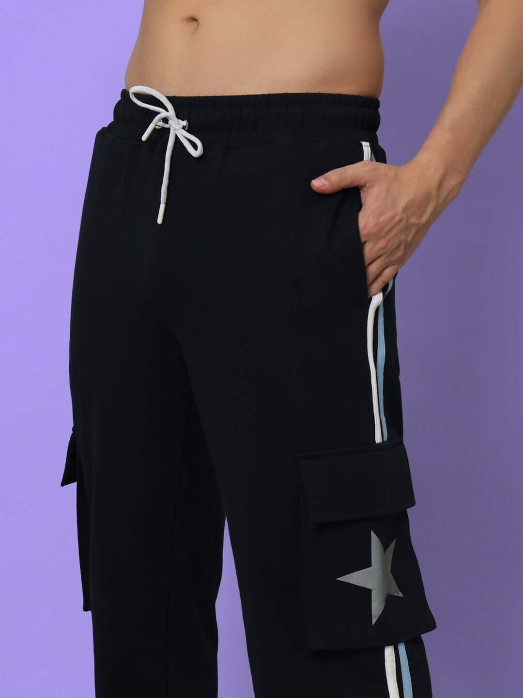 Navy blue DUDS FORCE joggers with star design, showing cargo pockets and drawstring, crafted by experienced tailors. Custom fit available.