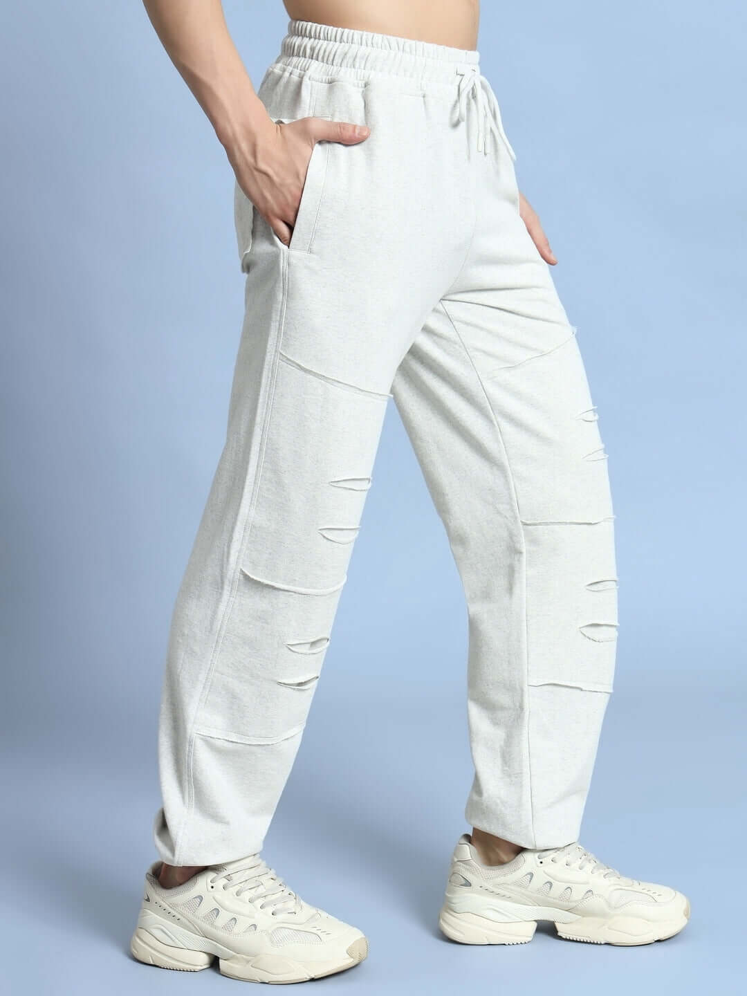 Person wearing DUDS Graze Joggers in melange grey with a relaxed fit.