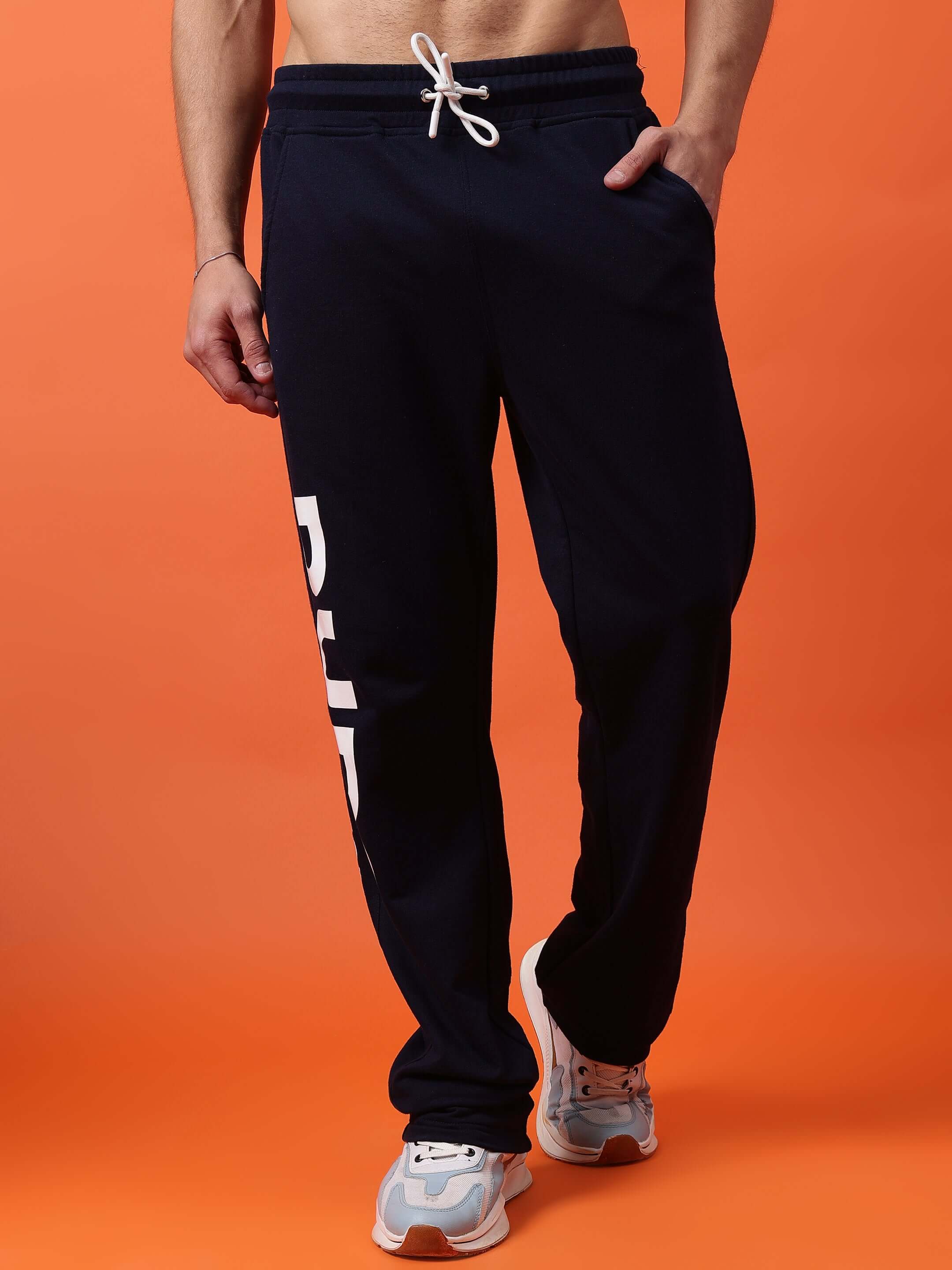Man wearing DUDS Limited Edition Navy Blue Jogger, custom fit option available, made-to-order with skilled craftsmanship.