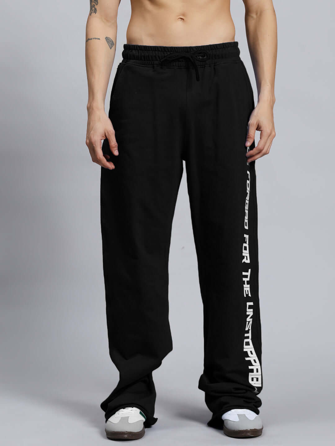 DUDS SWIFT JOGGER in black with customizable sizing, featuring text design 'FOR THE UNSTOPPABLE' on leg, made for quality and comfort.