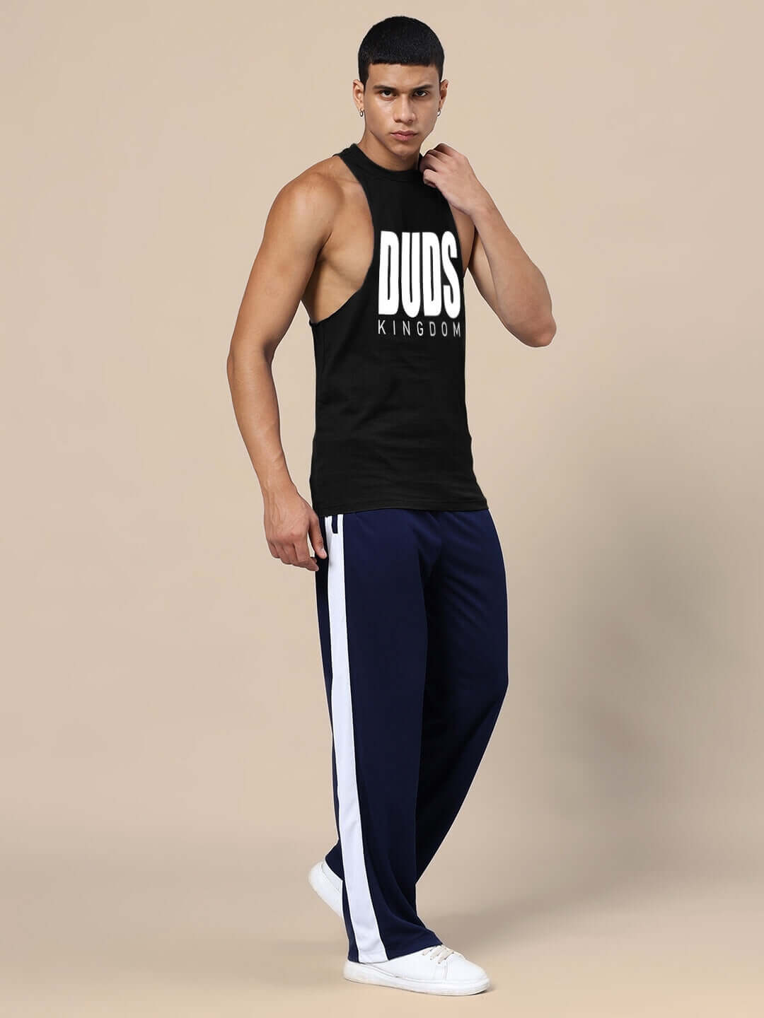 Person wearing DUDS KINGDOM GYM CO-ORD SET BLACK NAVY-BLUE, featuring relaxed fit joggers and sleeveless top.