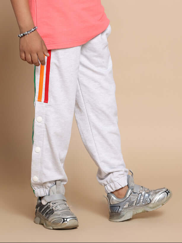 Alt Tag: Melange grey joggers with colorful stripes, suitable for kids. DUDS custom fit option available, made by skilled tailors.