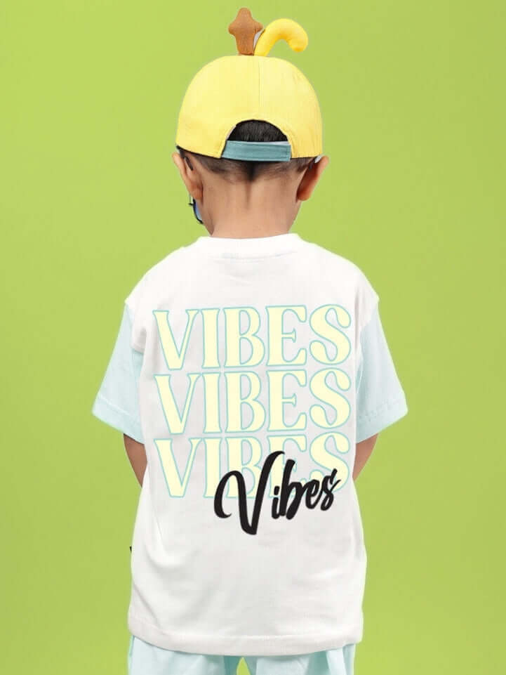 Child wearing DUDS VIBES T-SHIRT FOR BOYS GIRLS OFF WHITE-BLUE with graphic design on back.