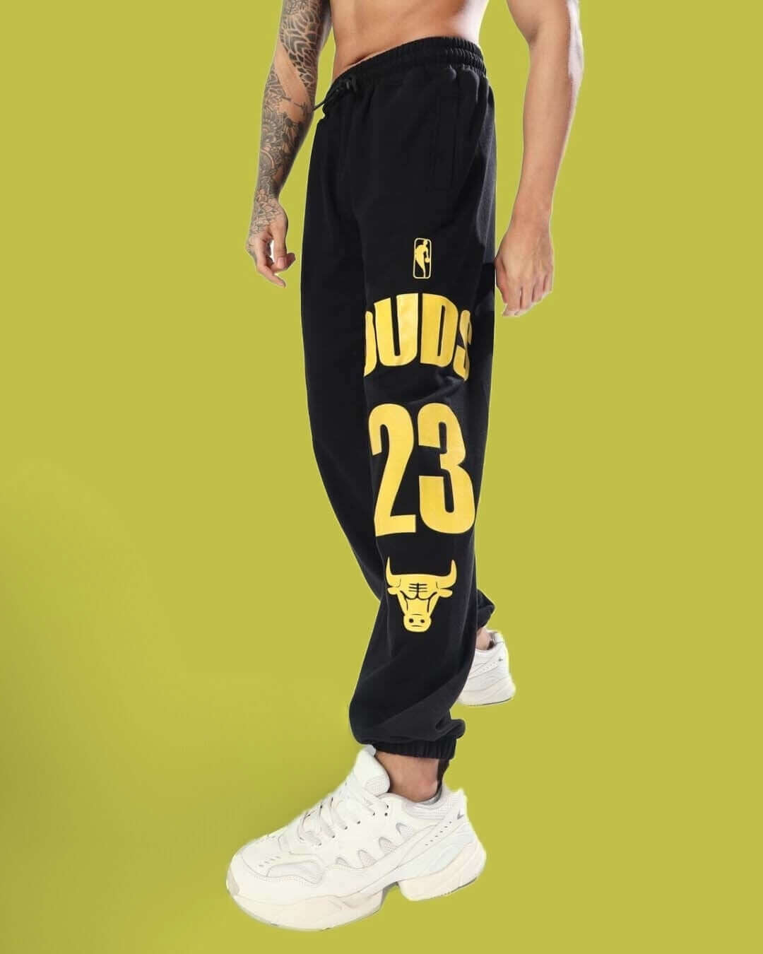 DUKE Relaxed Pant Jogger in black, featuring bold graphics, tailored for comfort and customization by DUDS' skilled tailors.