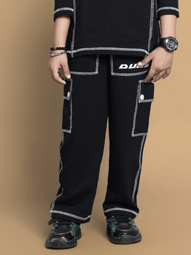 Dynamic black joggers for boys and girls, featuring comfortable fit and custom sizing options, crafted by DUDS.