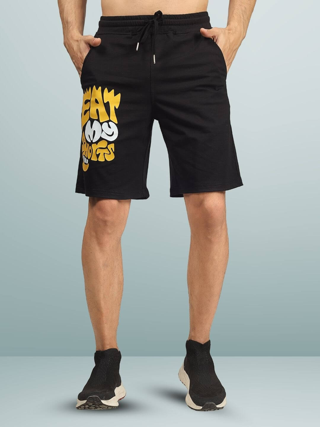 Black EAT MY SHORTS regular fit men's shorts with custom fit options, featuring bold graphic design. Perfect for casual wear and comfort.