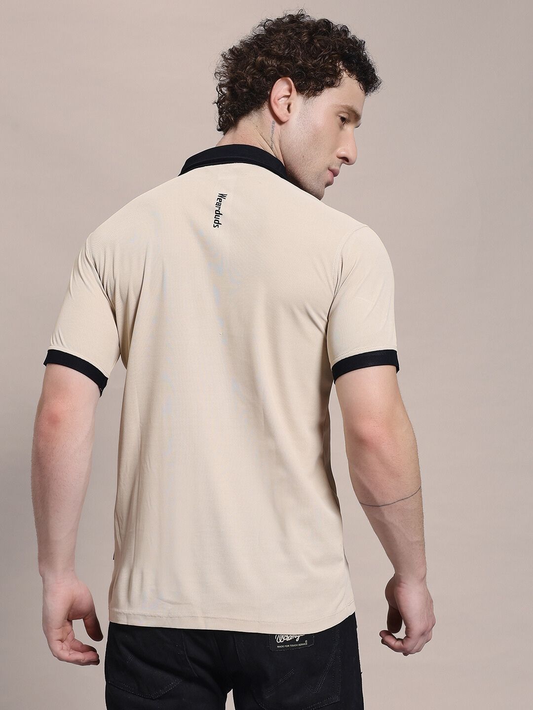 Back view of EDGE POLO REGULAR FIT T-SHIRT BEIGE BLACK showcasing classic collar and two-tone design.
