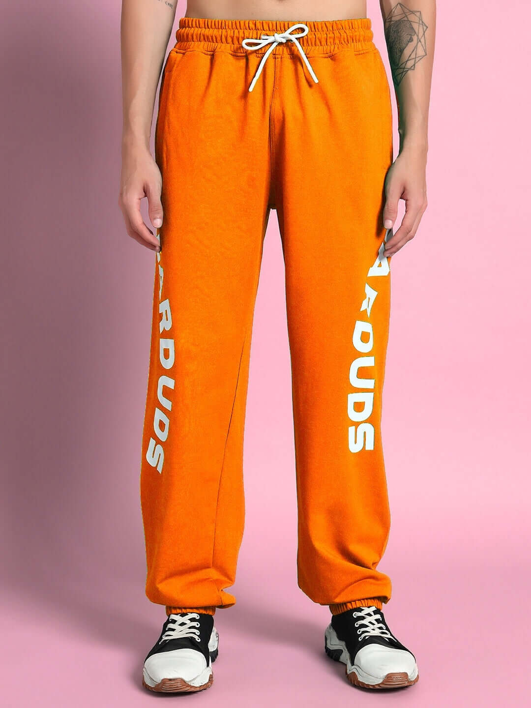 Ellen Relaxed Fit Jogger in orange, showcasing comfortable fit and style with customizable sizing options from DUDS.
