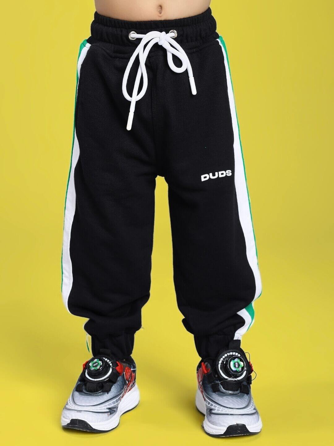 EMIRATI JOGGER FOR BOYS AND GIRLS BLACK GREEN with stylish white stripes and drawstring, perfect for active kids.