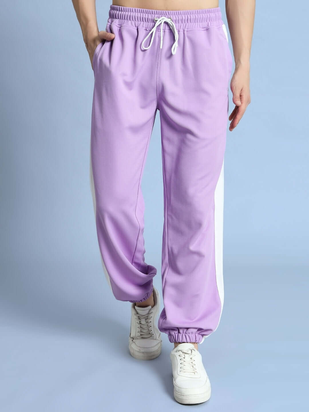 Person wearing Euphoria Joggers in lavender and white, showcasing stylish and comfortable made-to-order fashion.