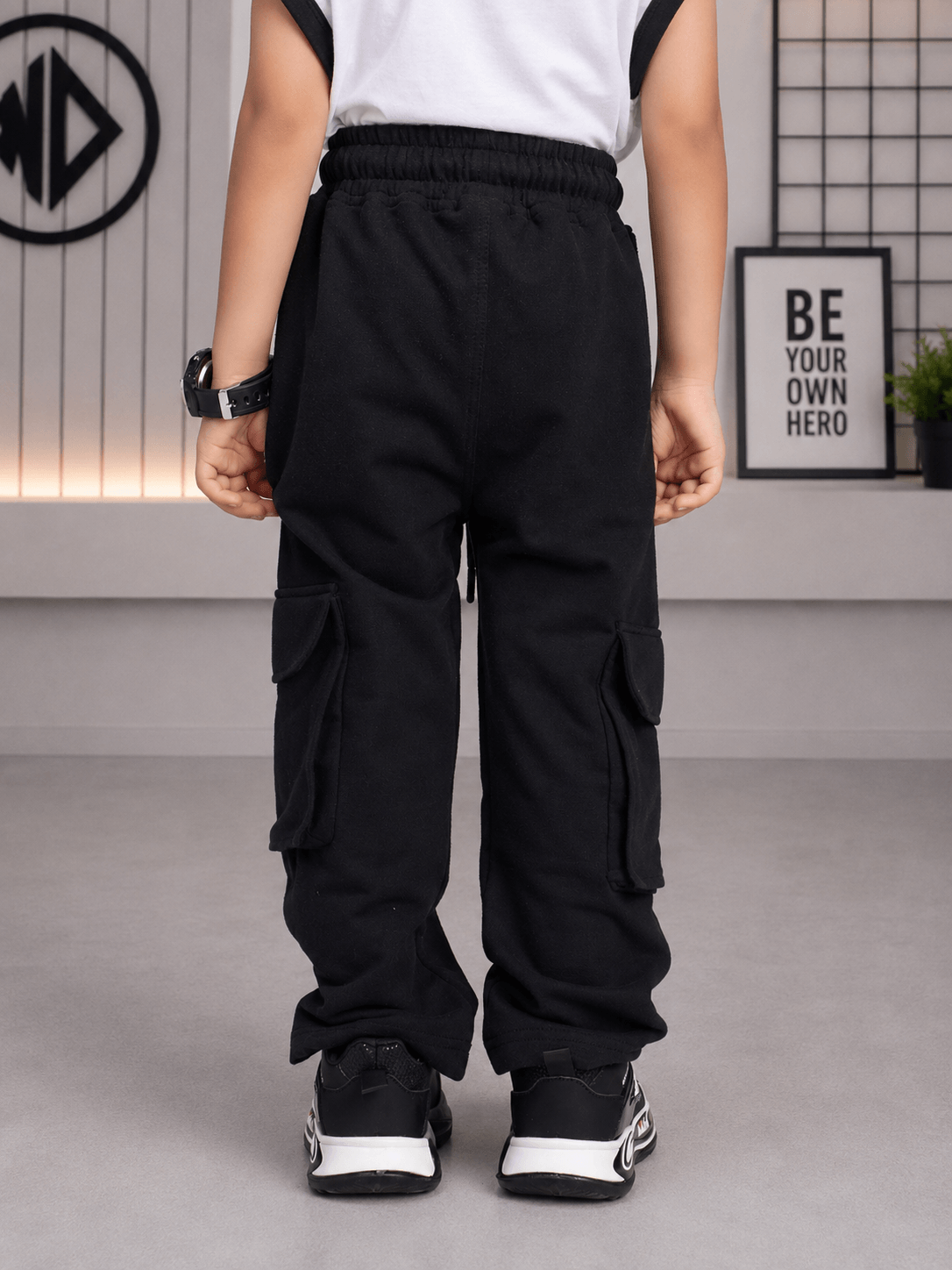 Everyday Adventure Jogger for Boys Girls Black showcased on a child from the back, featuring a comfortable fit and stylish design.