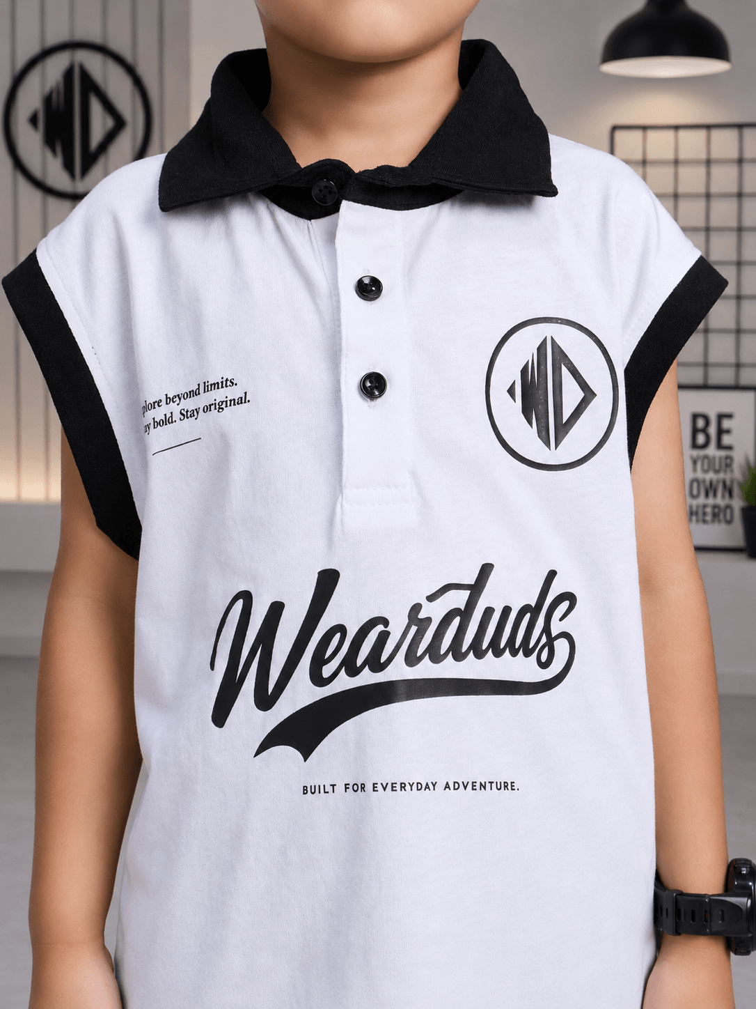 EVERYDAY ADVENTURE T-SHIRT FOR BOYS GIRLS WHITE displayed on a child wearing a stylish white shirt with a black collar.