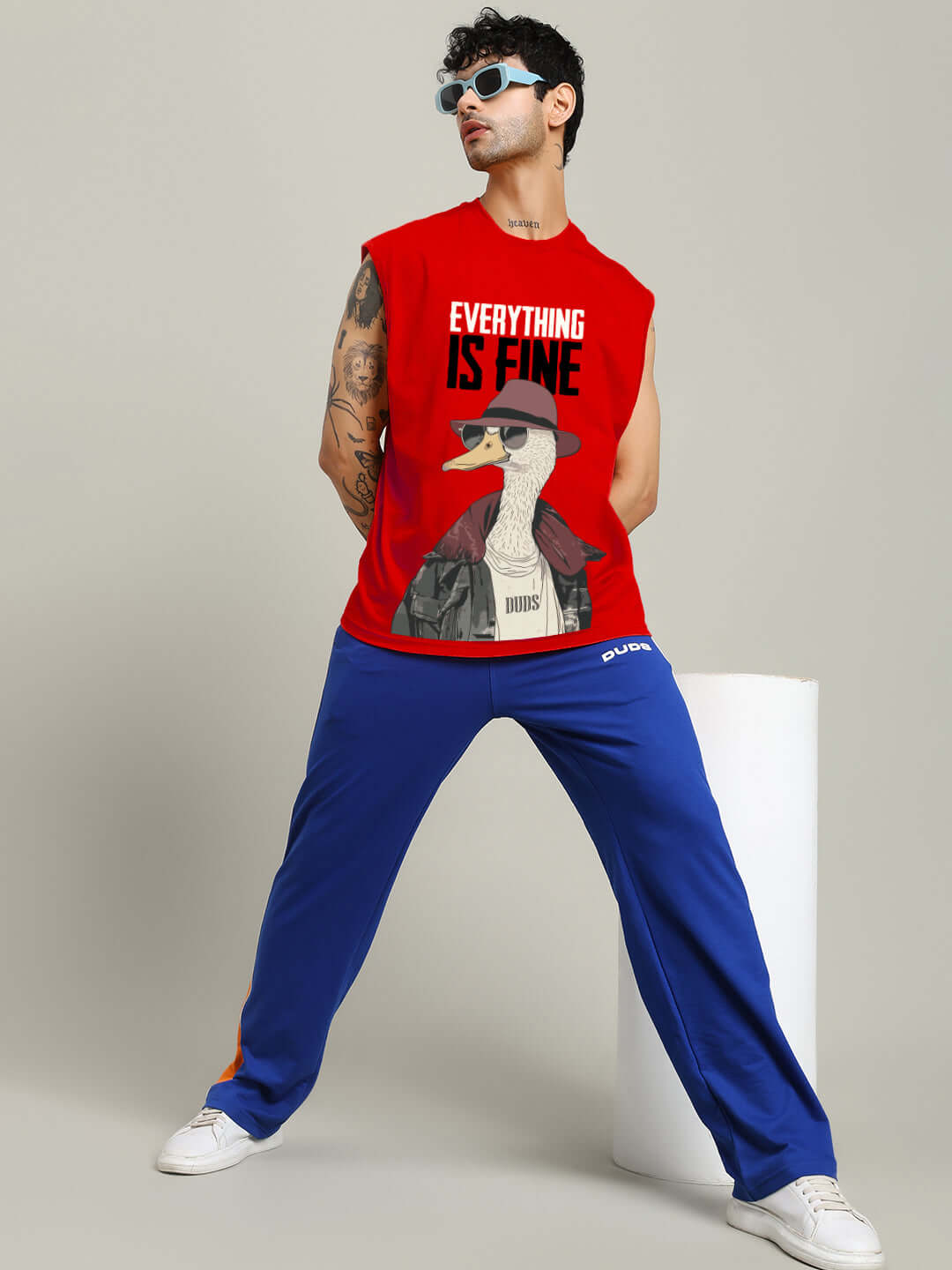 EVERYTHING FINE GYM T-SHIRT RED on person striking a pose.