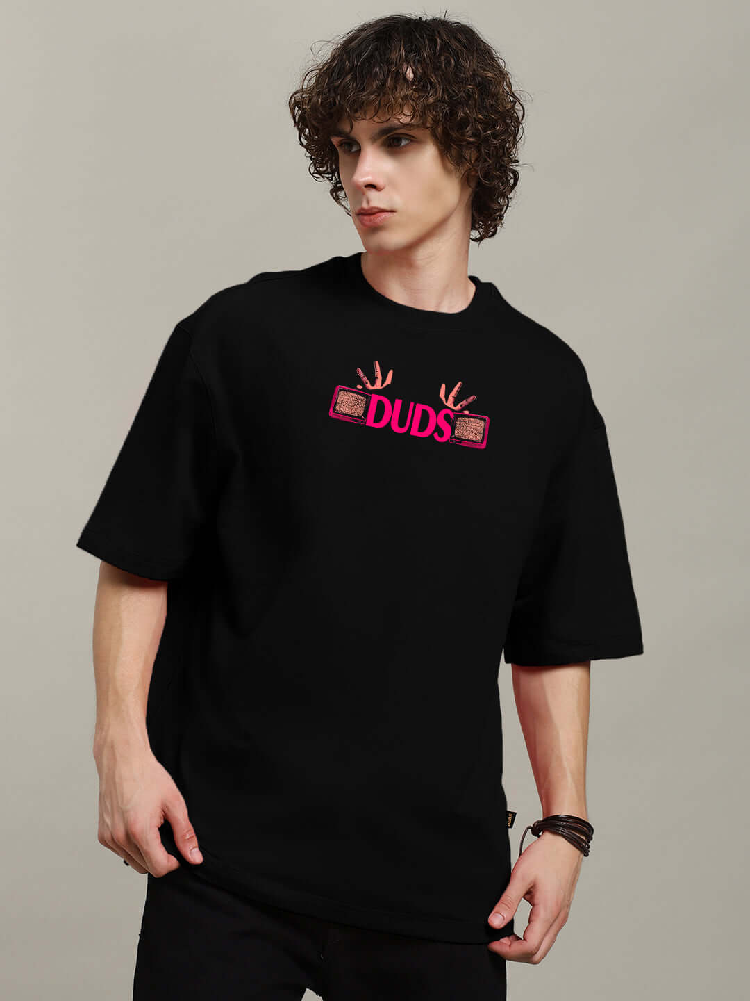 Model wearing Eyeconic Oversized Printed Black T-Shirt made from premium cotton French terry fabric, showcasing stylish design.