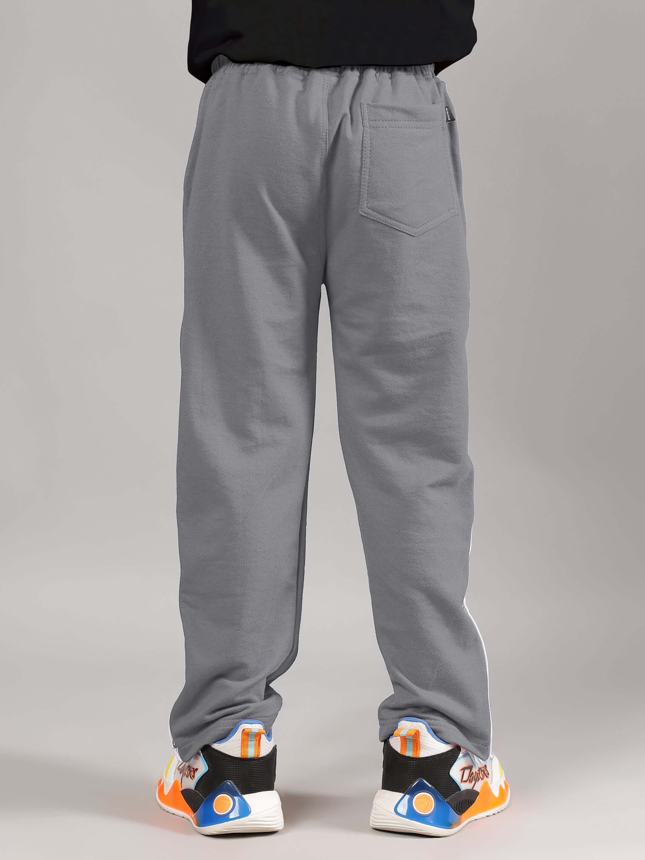 Rear view of EZEL JOGGER FOR BOYS & GIRLS GREY, showcasing relaxed fit and stylish design, perfect for everyday casual wear.