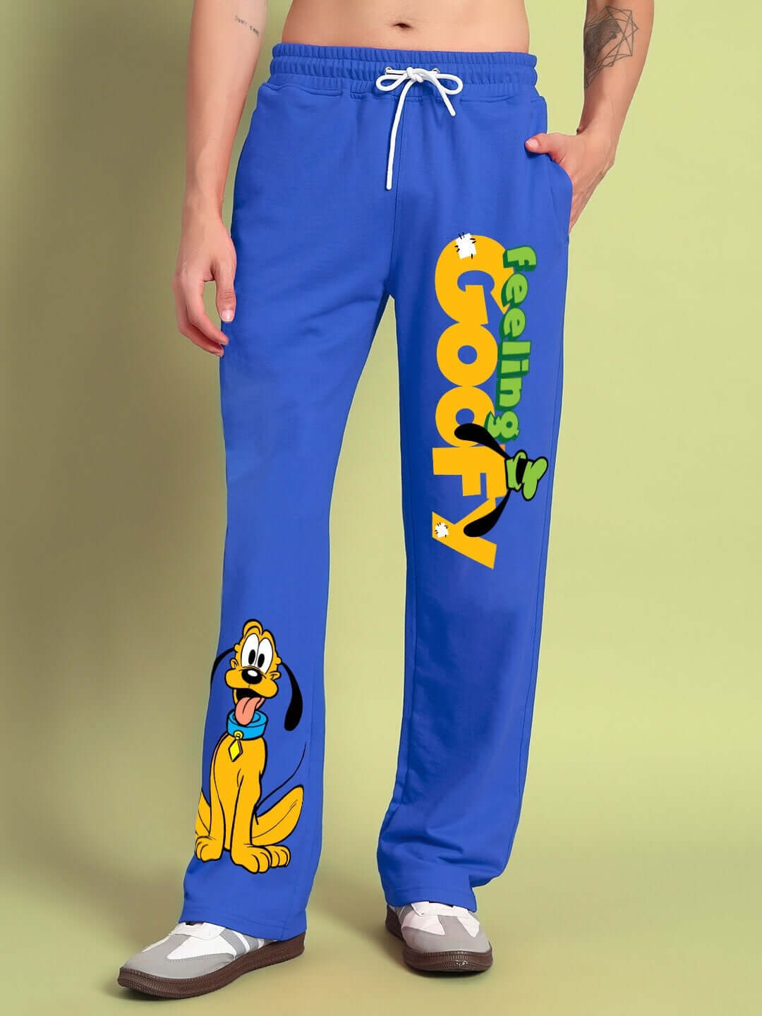 Alt Tag: Blue joggers with 'Feeling Goofy' text and cartoon design, relaxed fit, customizable size, made by experienced tailors at DUDS.