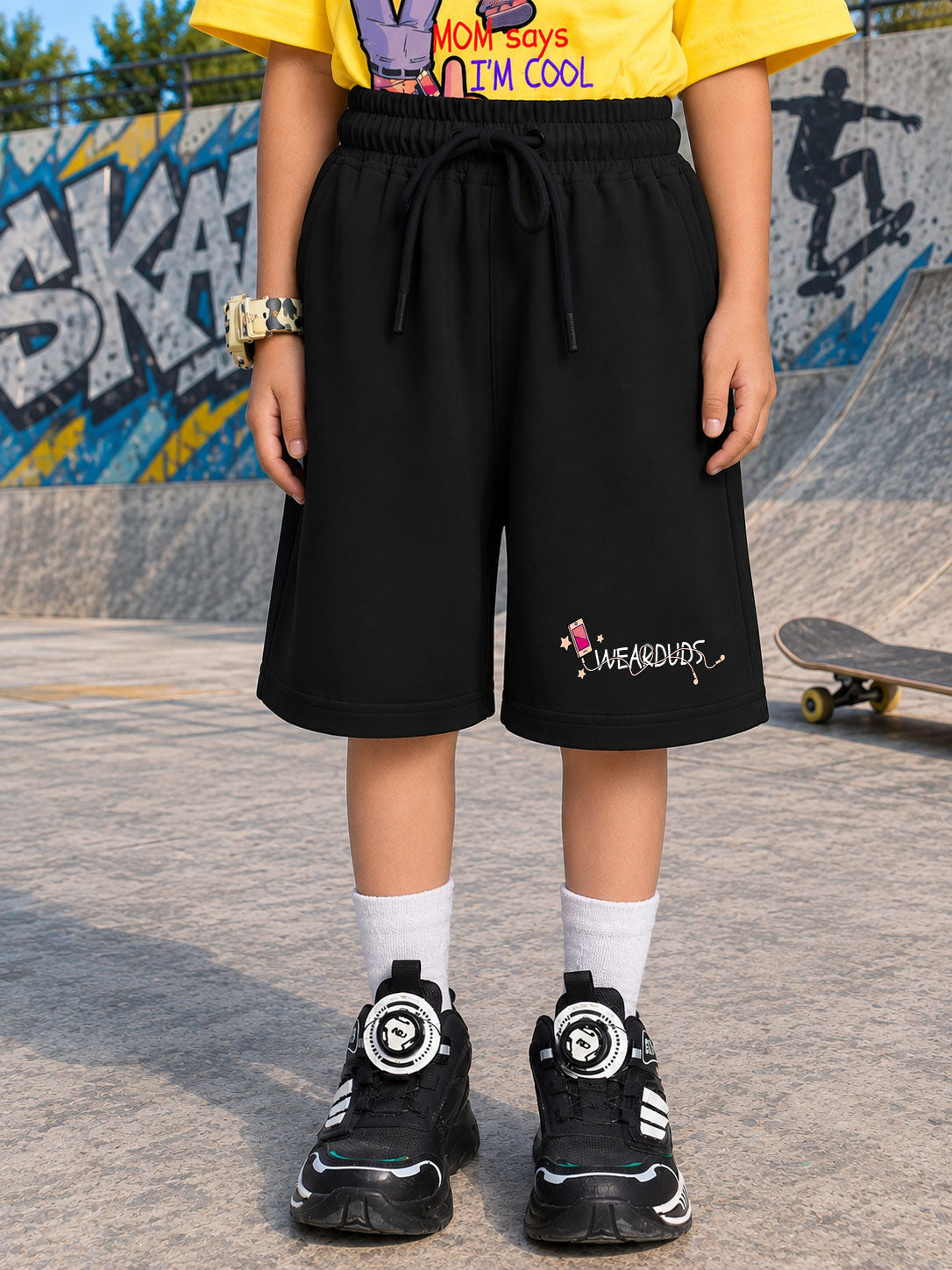 COOL DUDE SKATER CO-ORD FOR BOYS GIRLS BLACK YELLOW BLACK featuring black shorts and stylish matching sneakers.