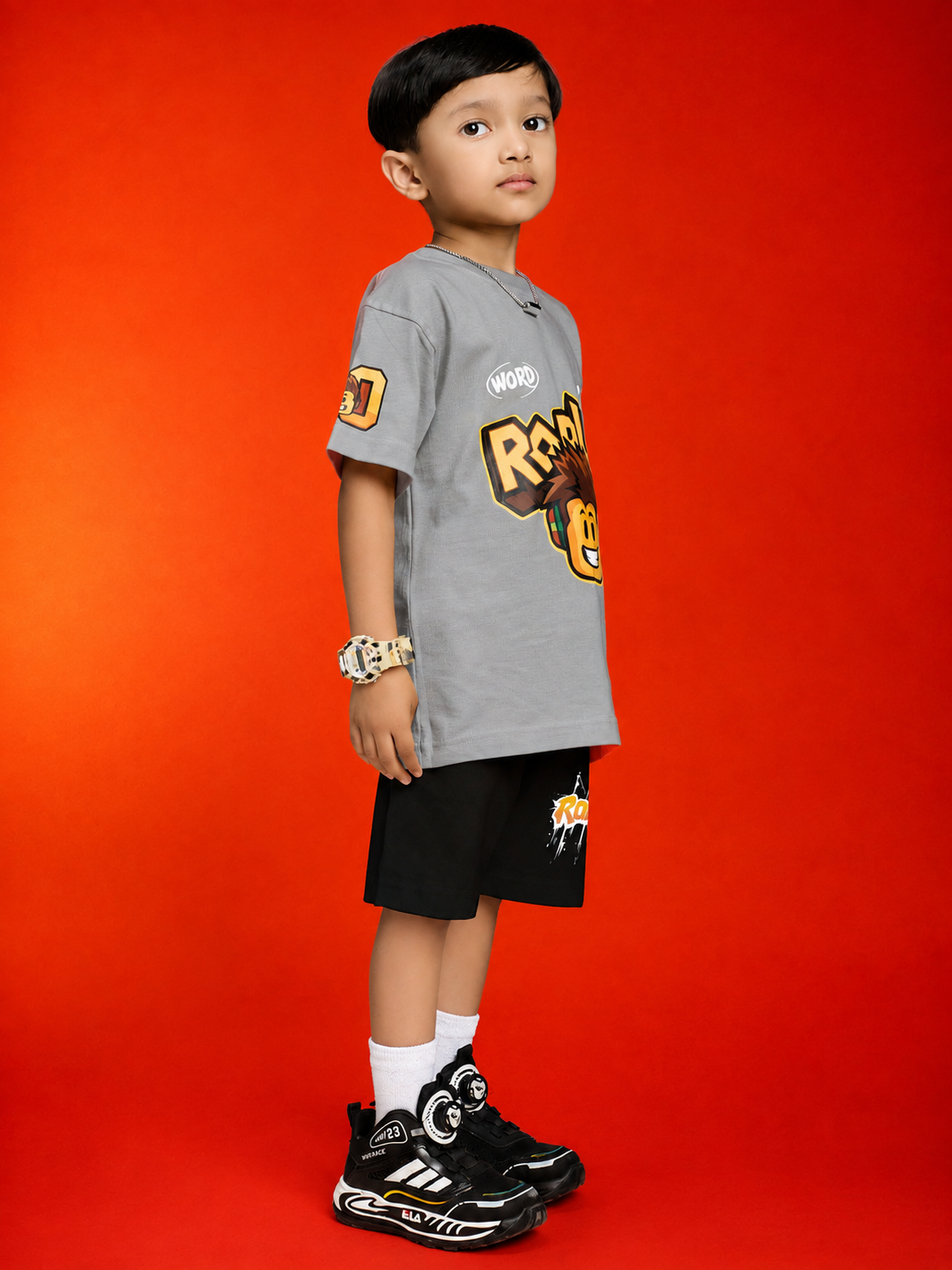 ROBLOX WORLD FIT CO-SET FOR BOYS GIRLS GREY BLACK on a child wearing a grey t-shirt and black shorts.
