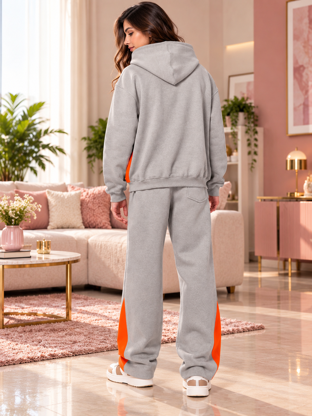 WOMEN WORLDWIDE FLEECE COLORBLOCK CO-ORD GREY hoodie and pants set styled in a cozy living room setting