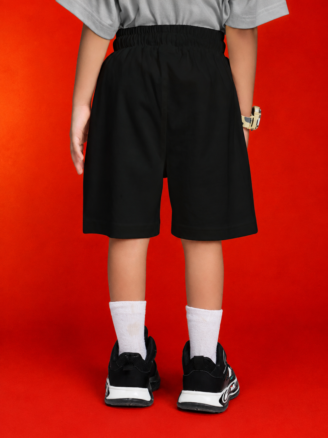 Back view of child wearing black shorts from ROBLOX WORLD FIT CO-SET FOR BOYS GIRLS GREY BLACK.