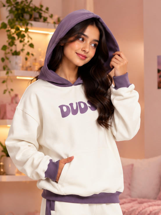 WOMEN SELF LOVE FLEECE OVERSIZED HOODIE WHITE VIOLET worn by smiling model, cozy fit with kangaroo pocket