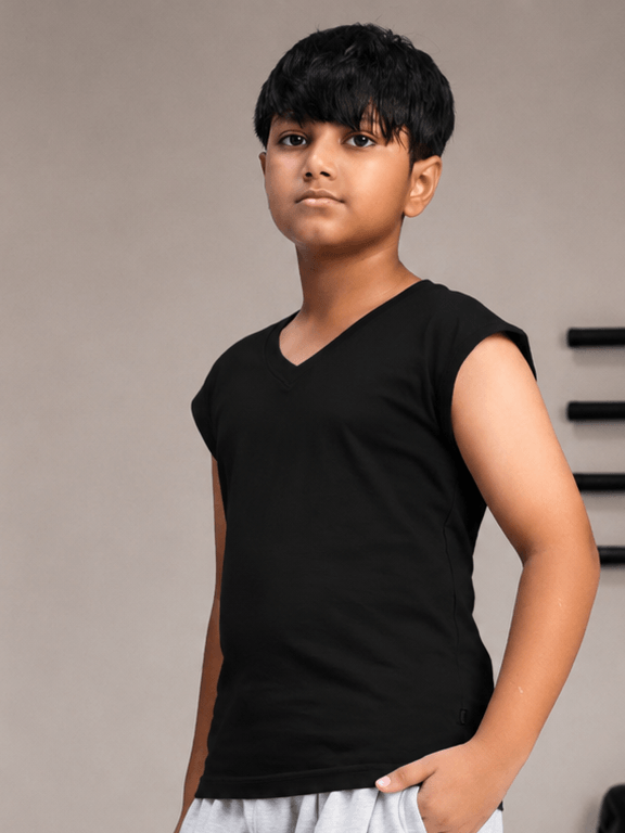 LEVELUP GAMER T-SHIRT FOR BOYS GIRLS BLACK worn by a boy, showcasing gaming style in a cool black design.
