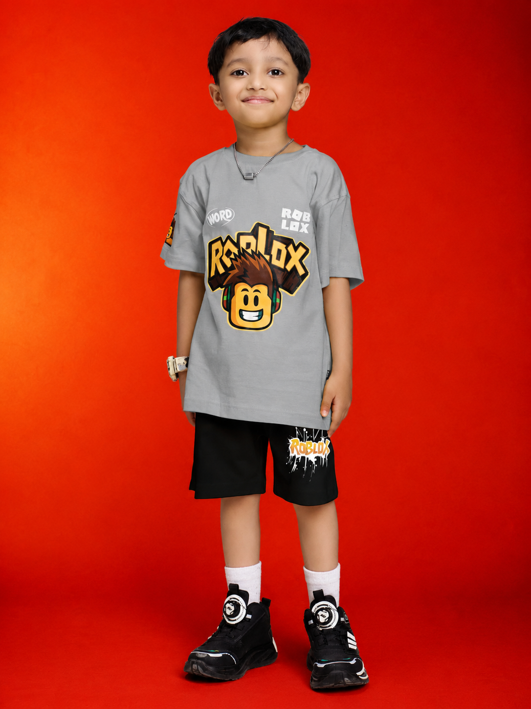 ROBLOX WORLD FIT CO-SET FOR BOYS GIRLS GREY BLACK worn by a boy, featuring a grey shirt and black shorts.