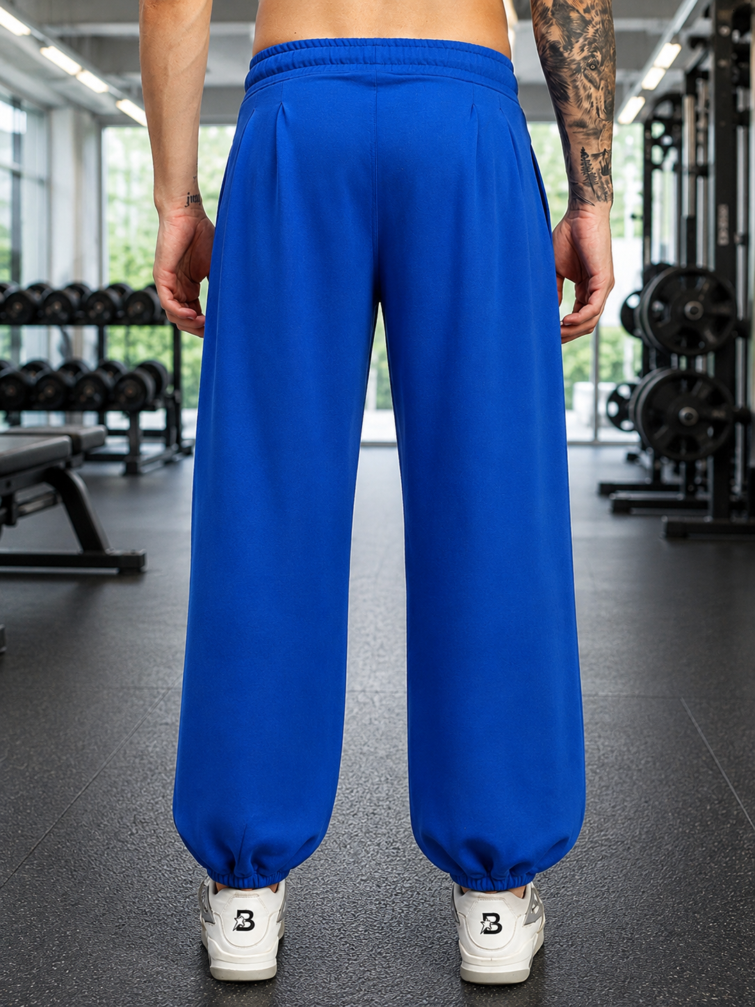 Back view of COOLFIT BAGGY LOOSE FIT JOGGER BLUE showcasing its relaxed fit and vibrant color.