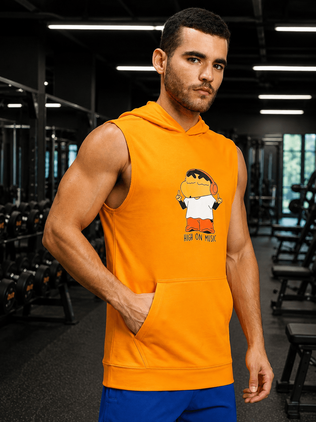 BEAT MODE SLEEVELESS HOODED T-SHIRT WHITE ORANGE worn by a male model in a gym setting.