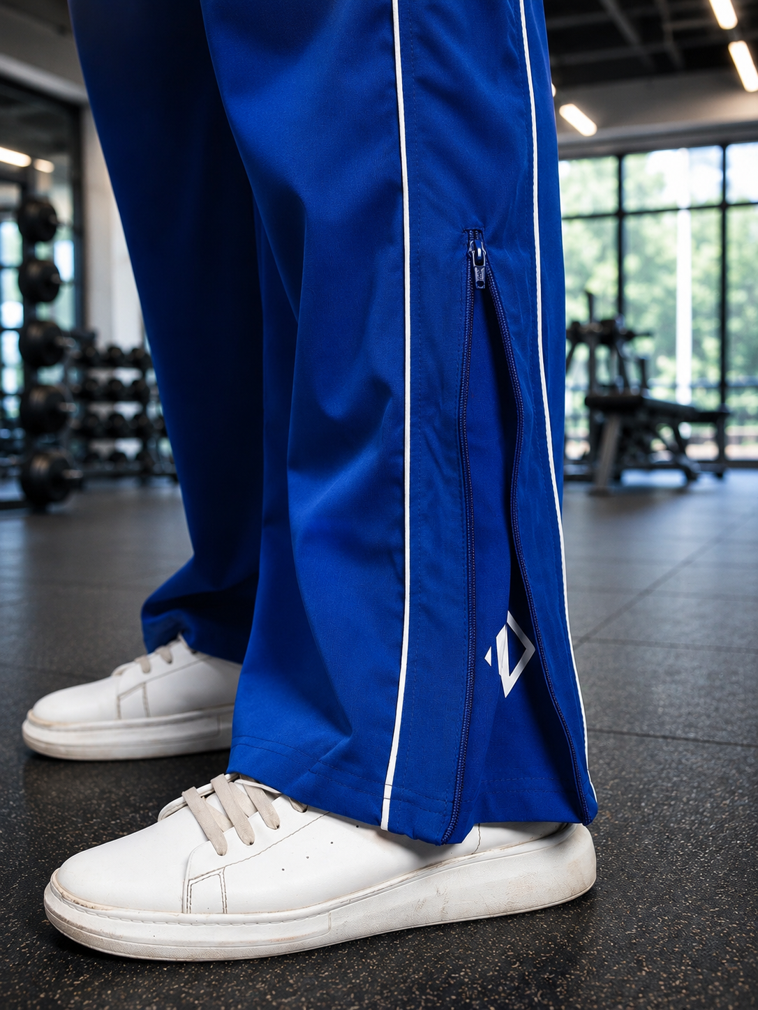 RELIGHT RELAXED FIT CO-ORD SET BLUE featuring zippered detailing and a relaxed fit in a gym setting.