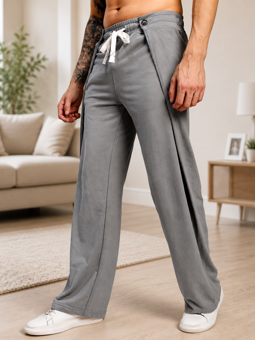 OMEGA FLOW WIDE FIT JOGGERS GREY featuring a relaxed silhouette, perfect for casual outings or workouts.