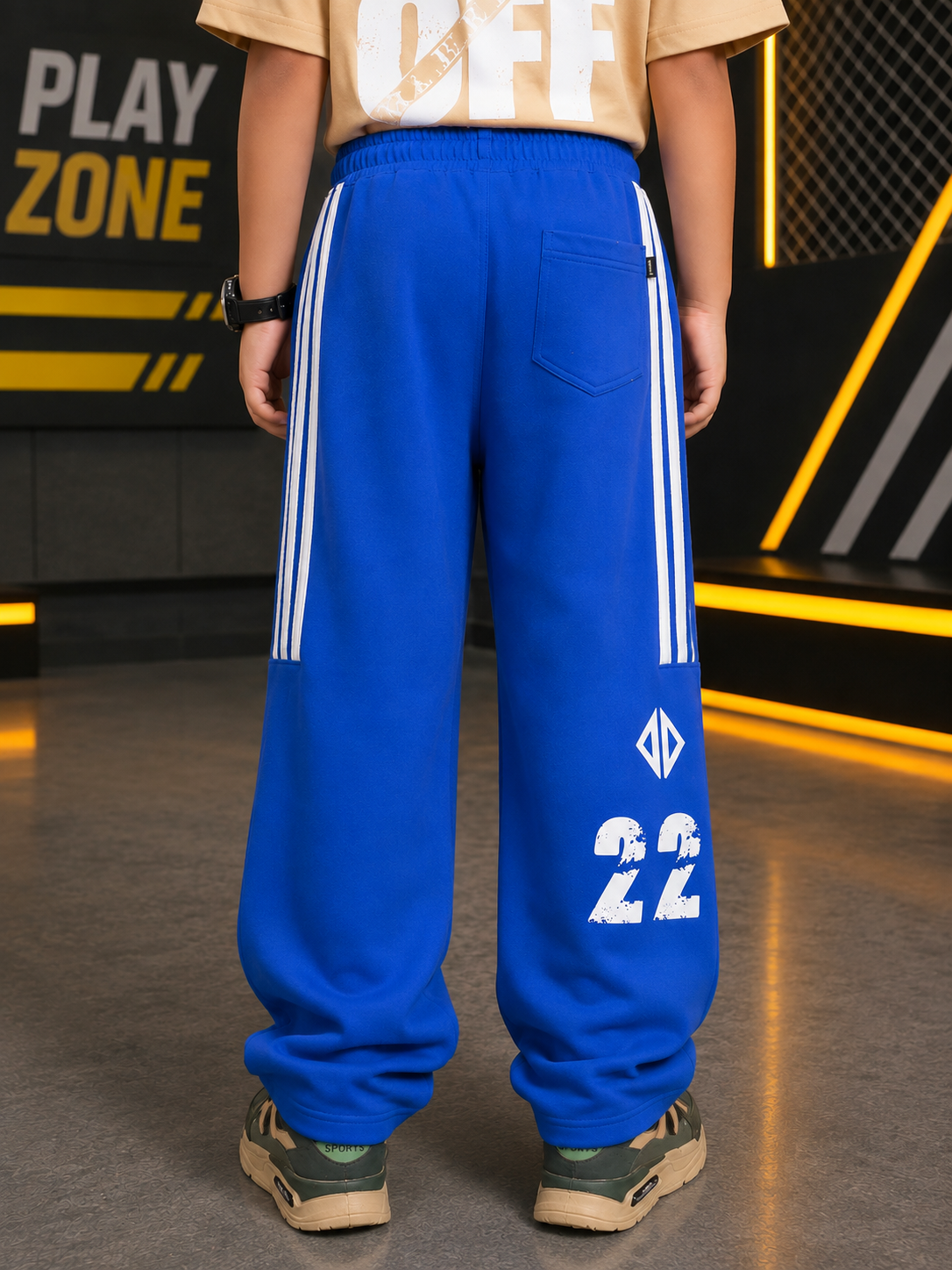 NEO STREET DROP JOGGER FOR BOYS GIRLS BLUE back view, featuring a vibrant blue color with sporty white stripes and number 22.