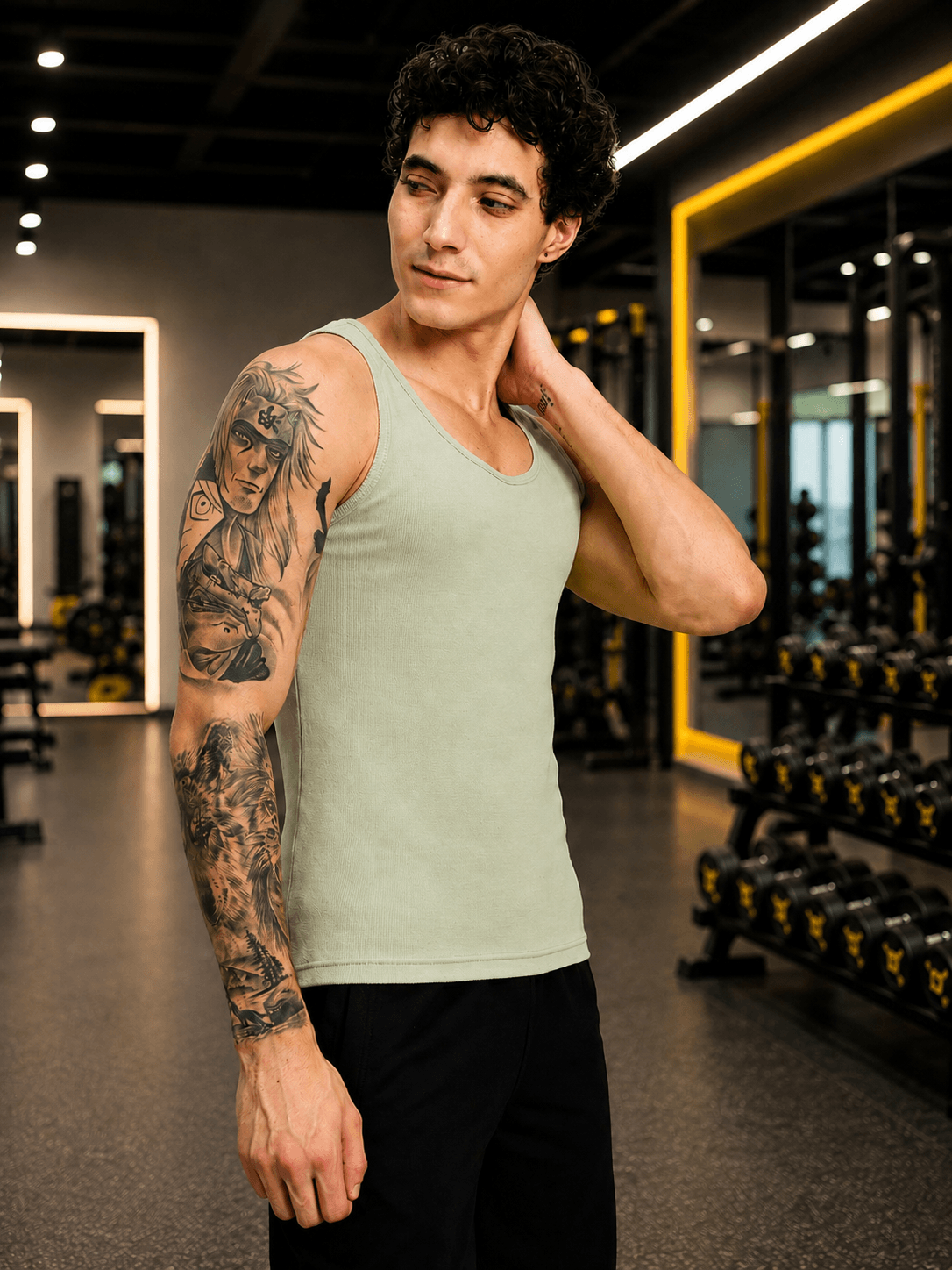 WEARDUDS Shop EASY WEAR VEST GYM T-SHIRT SAGE GREEN for a trendy, versatile sporty look perfect for gym sessions, workouts, and everyday wear.
